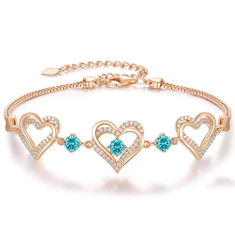 Romantic Heart Bracelet with Red Gemstones & Diamond Accents in Sterling Silver