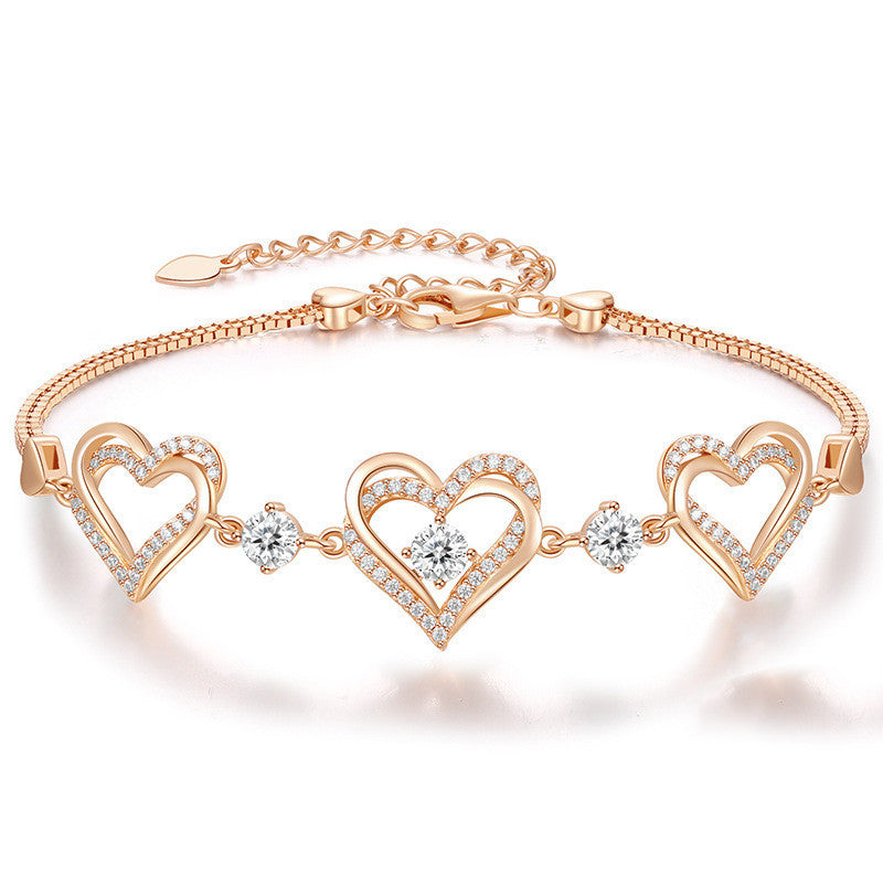 Romantic Heart Bracelet with Red Gemstones & Diamond Accents in Sterling Silver