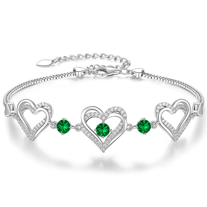 Romantic Heart Bracelet with Red Gemstones & Diamond Accents in Sterling Silver