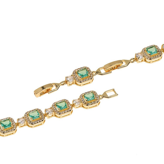 Golden Glow Emerald Square Tennis Bracelet