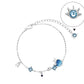 Celestial Charm Bracelet with Blue Gemstones & Moon-Star Design in Sterling Silver