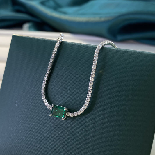 Regal Radiance: Sterling Silver Emerald-Cut Tennis Bracelet