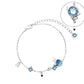 Celestial Charm Bracelet with Blue Gemstones & Moon-Star Design in Sterling Silver