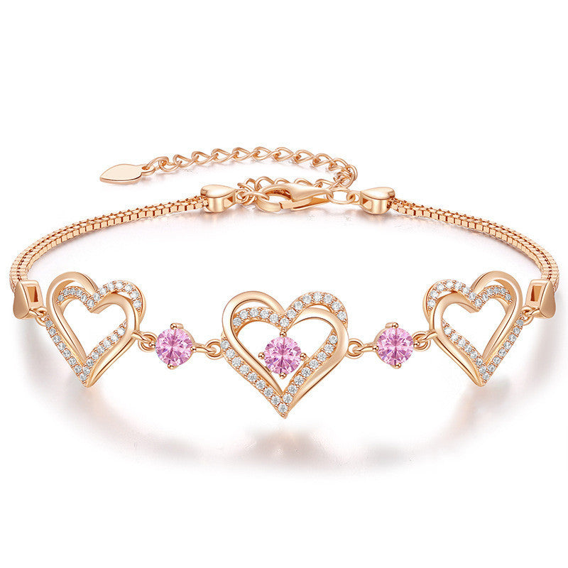 Romantic Heart Bracelet with Red Gemstones & Diamond Accents in Sterling Silver