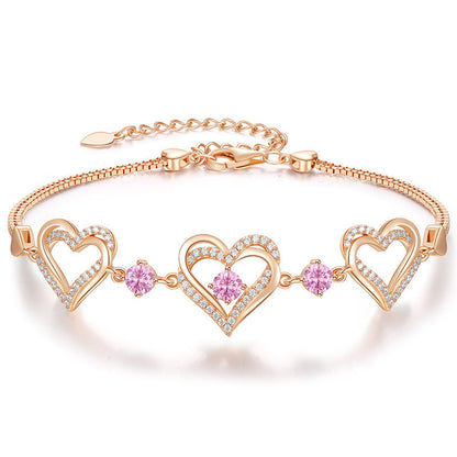 Romantic Heart Bracelet with Red Gemstones & Diamond Accents in Sterling Silver