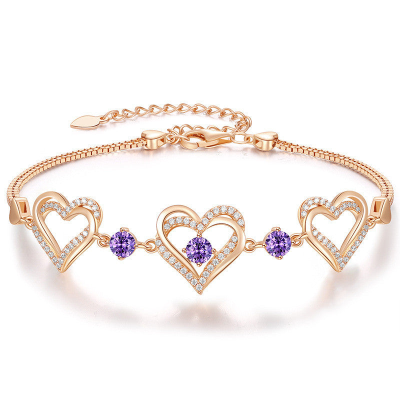 Romantic Heart Bracelet with Red Gemstones & Diamond Accents in Sterling Silver