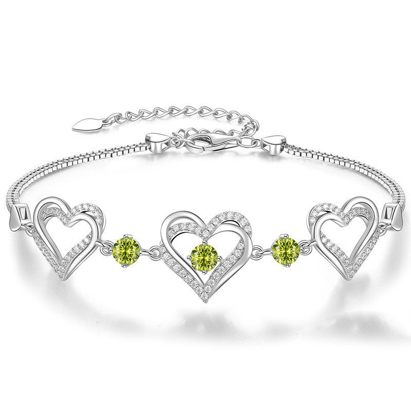 Romantic Heart Bracelet with Red Gemstones & Diamond Accents in Sterling Silver