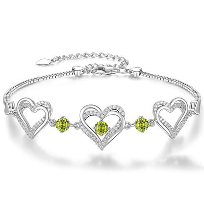 Romantic Heart Bracelet with Red Gemstones & Diamond Accents in Sterling Silver