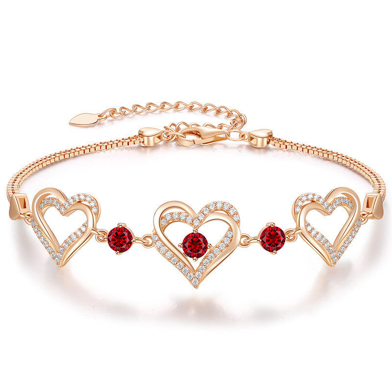Romantic Heart Bracelet with Red Gemstones & Diamond Accents in Sterling Silver
