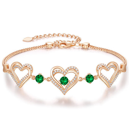 Romantic Heart Bracelet with Red Gemstones & Diamond Accents in Sterling Silver