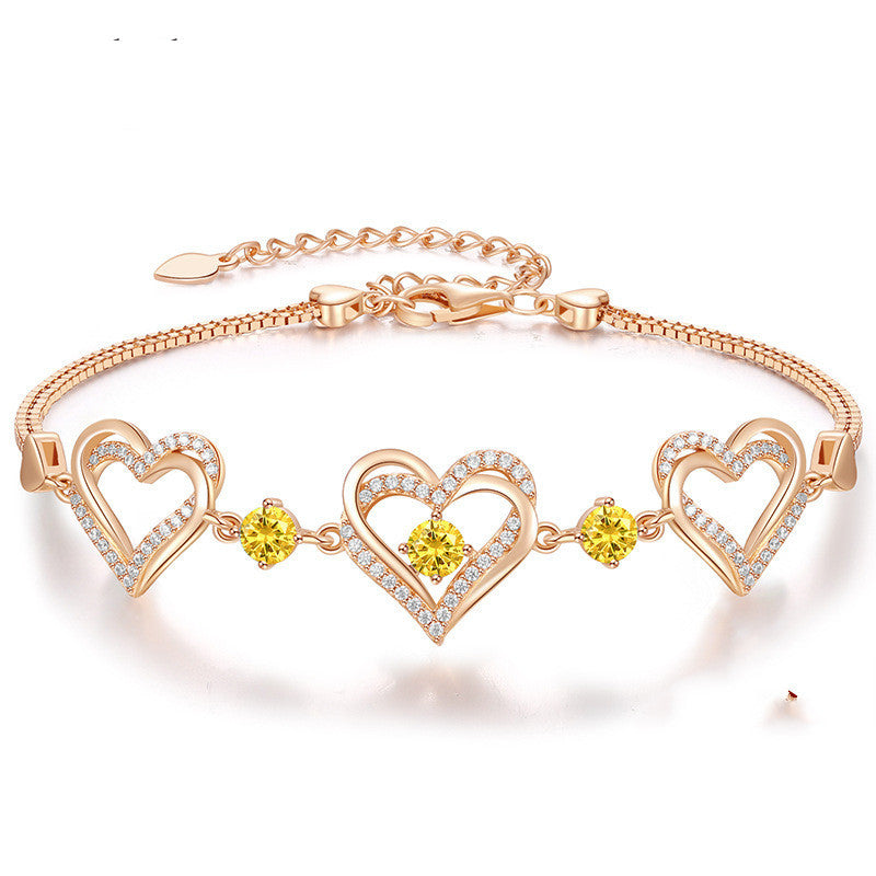 Romantic Heart Bracelet with Red Gemstones & Diamond Accents in Sterling Silver