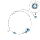 Celestial Charm Bracelet with Blue Gemstones & Moon-Star Design in Sterling Silver