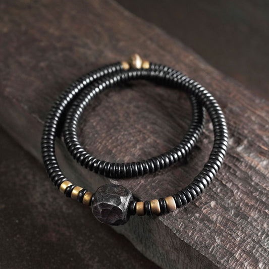 The Nomadic Relic: Hand-Forged Matte Wrap Bracelet with Antiqued Brass