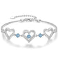 Romantic Heart Bracelet with Red Gemstones & Diamond Accents in Sterling Silver