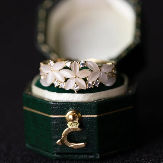 Elegant Floral Band Ring with White Petal Stones & Diamond Accents in Gold Finish