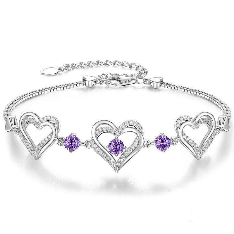 Romantic Heart Bracelet with Red Gemstones & Diamond Accents in Sterling Silver