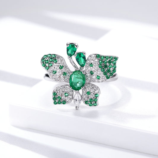 Luxury Butterfly Ring with Green Emeralds & White Diamond Accents in Sterling Silver