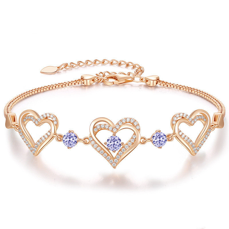 Romantic Heart Bracelet with Red Gemstones & Diamond Accents in Sterling Silver