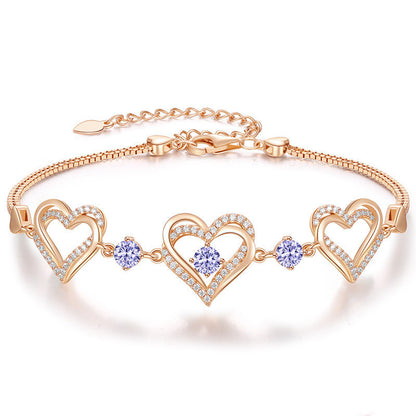 Romantic Heart Bracelet with Red Gemstones & Diamond Accents in Sterling Silver