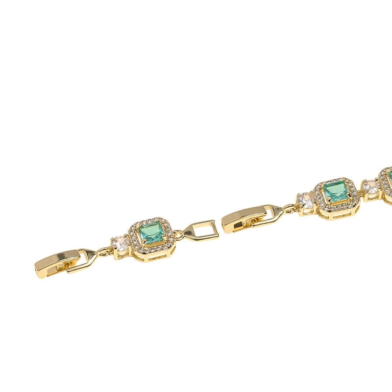Golden Glow Emerald Square Tennis Bracelet