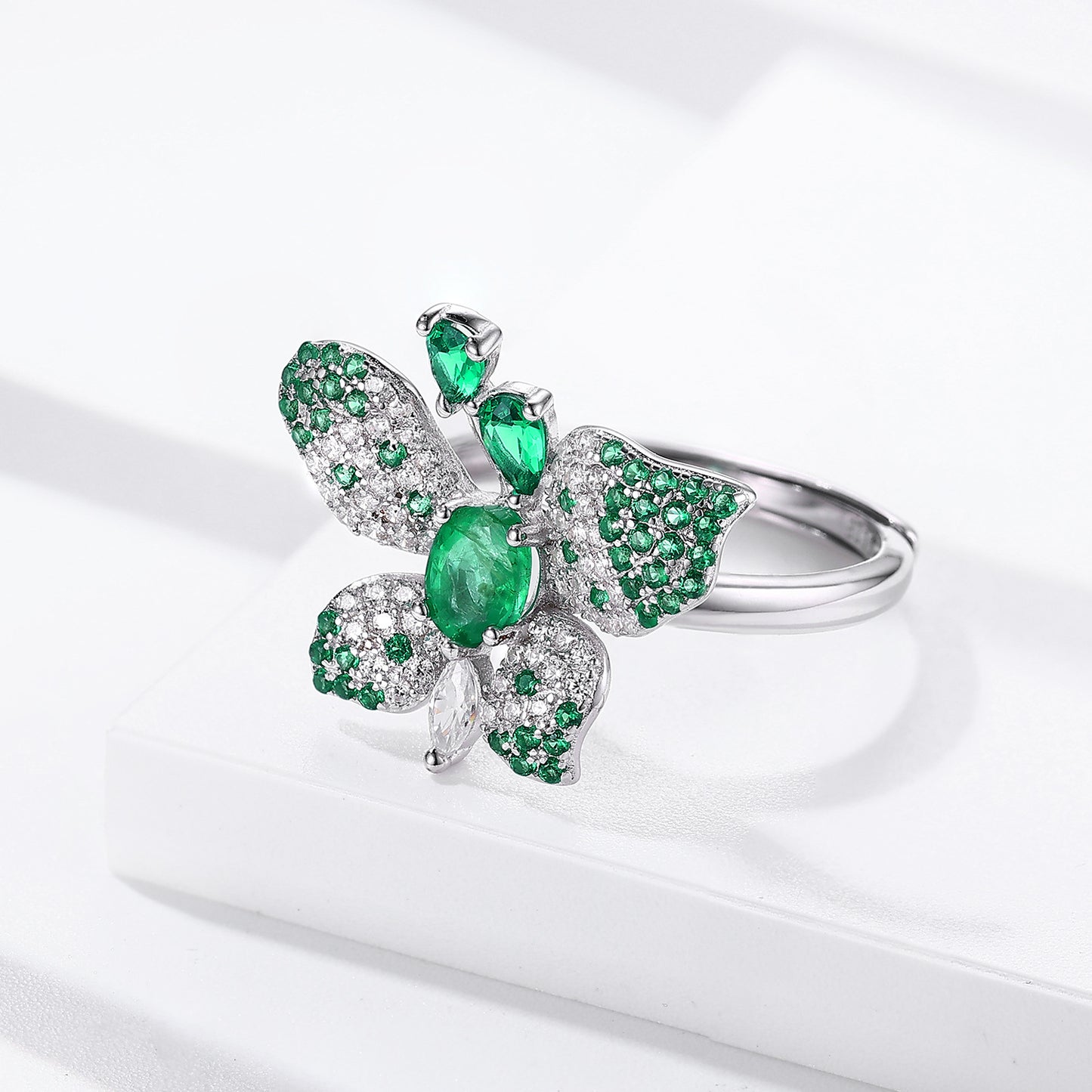 Luxury Butterfly Ring with Green Emeralds & White Diamond Accents in Sterling Silver