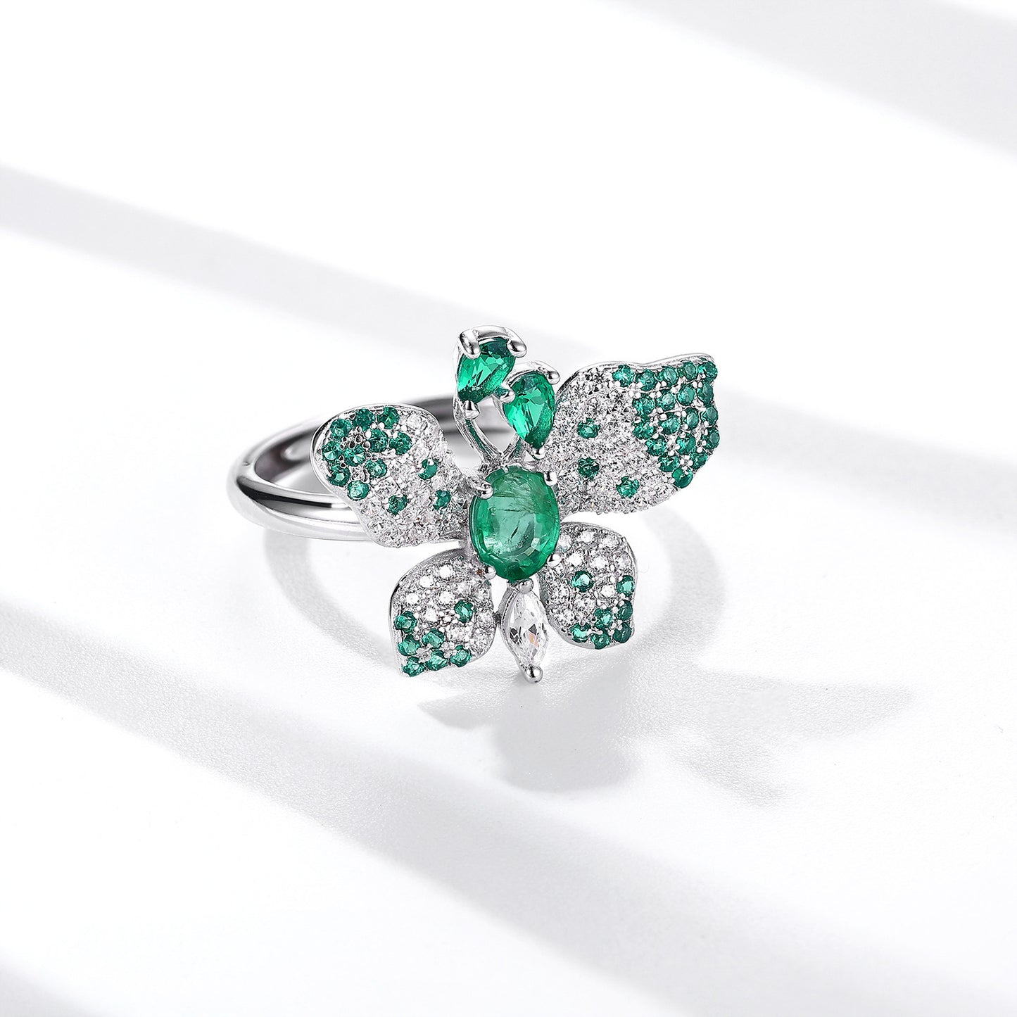 Luxury Butterfly Ring with Green Emeralds & White Diamond Accents in Sterling Silver