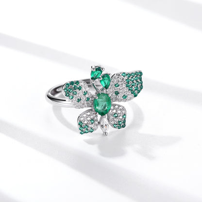 Luxury Butterfly Ring with Green Emeralds & White Diamond Accents in Sterling Silver