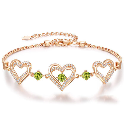 Romantic Heart Bracelet with Red Gemstones & Diamond Accents in Sterling Silver